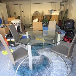 Glass Table & 4 Chairs.