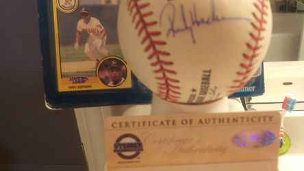 Signed Rickey Henderson baseball certificate of authenticity