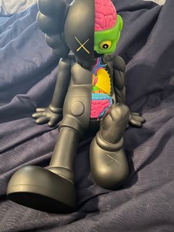 Kaws Resting Place Figure