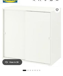 White sliding storage doors cabinet