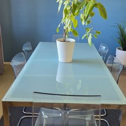 Ikea Glass Table And Plastic Chairs