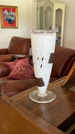 Lists Boda white speckled vase.