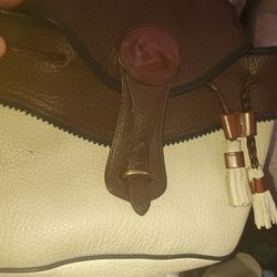 Dooney And Burke Saddle Bag In Great Shape Inside And Out.
