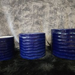 Set of three ceramic pots