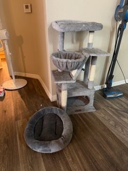 Short gray cat tree and bed.