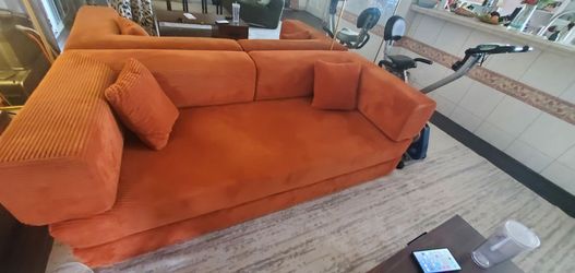 Like New orange sofa,