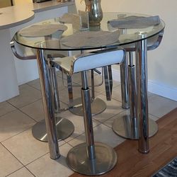 Clear Glass Table & Modern White Chairs