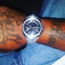 Gucci watch With Bull City Shirt