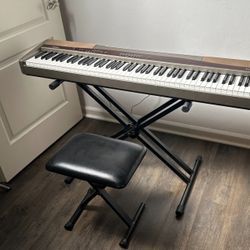 Fully Functional Electronic Keyboard Piano FOR SALE! Chair and Stand included! Open to Offers