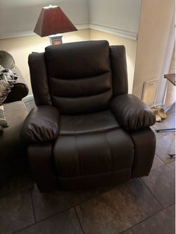 Big brown rocking, manual  recliner