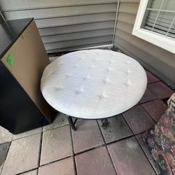 Round Upholstered Table