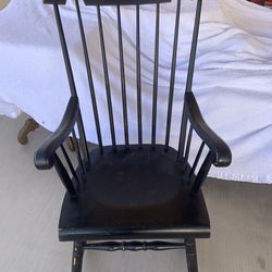 Sold wood rocking chair