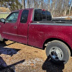  1999 Ford F-150 4x4 195K miles
