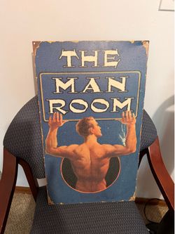 The man room metal sign