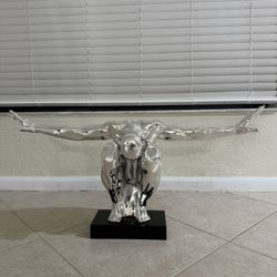 CHROME MAN WITH OUTSTRETCHED ARMS SCULPTURE LARGE