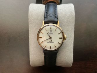 9 karat gold Rolex Tudor woman’s 24 mm beautiful white face