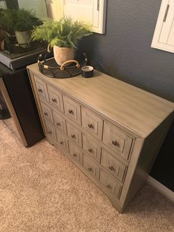 Gray Dresser with Detailed Drawers