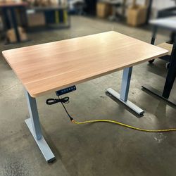 NEW IN BOX 48” Maple Electric Standing Desk with Gray Leg Frames, Sit and Stand Office Computer Desk, One Piece Desktop