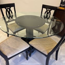 Black Pedestal w/ round glass dining table & 4 chairs