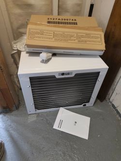 LG window AC and heating LW8016HR, 7500 BTUs. Never used like new