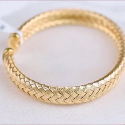 Pulsera vintage ajustable de plata de ley 925 con diseño trenzado y puño abierto.