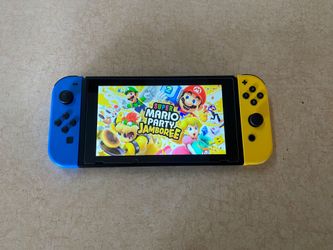NINTENDO SWITCH V2 with 125 SWITCH GAMES + 7500 RETRO GAMES