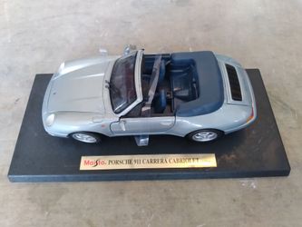 Maisto Special Edtn.1/18 Die Cast Porsche 911 Carrera Cabriolet

For 30dlls (Alvernon Between Drexel And Valencia)
