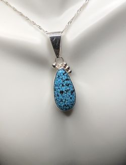 Natural Blackweb Kingsmen Turquoise 925 silver pendant on a 925 silver snake chain necklace. 48ct 21x29x8mm Deep Blue/Black Matrix