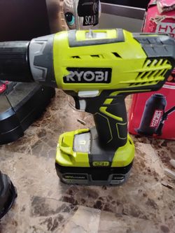 Ryobi Drill with bits and chargers