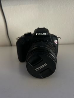 Canon EOS Rebel DSLR Camera with Lens