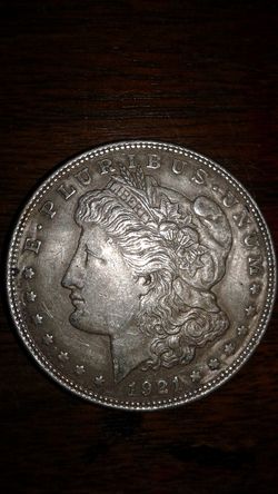 1921 silver dollar worth 40 bucks I'll take 30