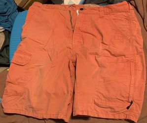 Orange Wrangler Jeans Co. Cargo Performance Series shorts