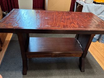 Carved solid wood table