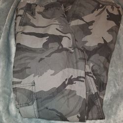 Brand new Wrangler Boys cargo camouflage pants. Size 14 regular