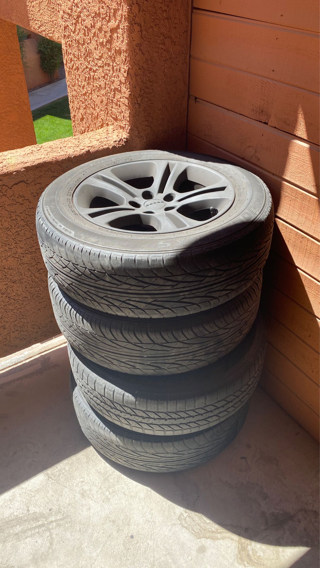 2015 dodge charger rims and tires 70/100 life on tires painted matte black comes off easily rims are originally grey make me an offer