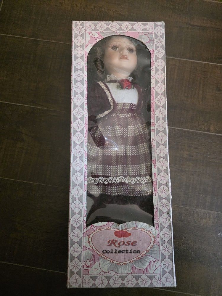2 Rose Collection Porcelain Dolls