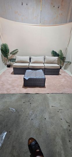 BRAND NEW 
Outdoor 3 Pieces Graish Rattan Armless Sofa Set And 1 Table With Khaki Cushions
