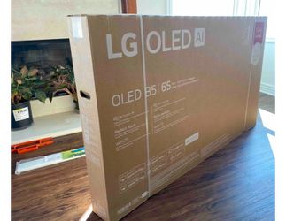 Brand new sealed box LG OLED B5 65” TV. NEVER OPENED!