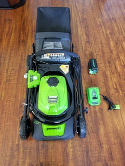 Green works new cordless 40 volt heavy duty, 20 inch lawn mower with battery and charger.