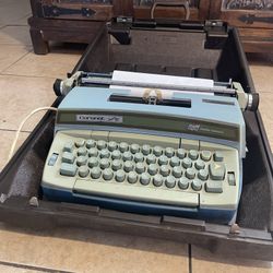 Blue vintage 1973 Coronet Super 12 Typewriter w/ Hard Case