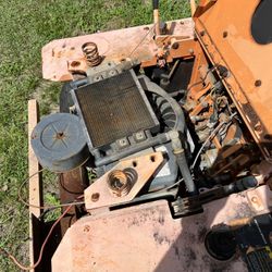 Old Lawnmower with motor on it