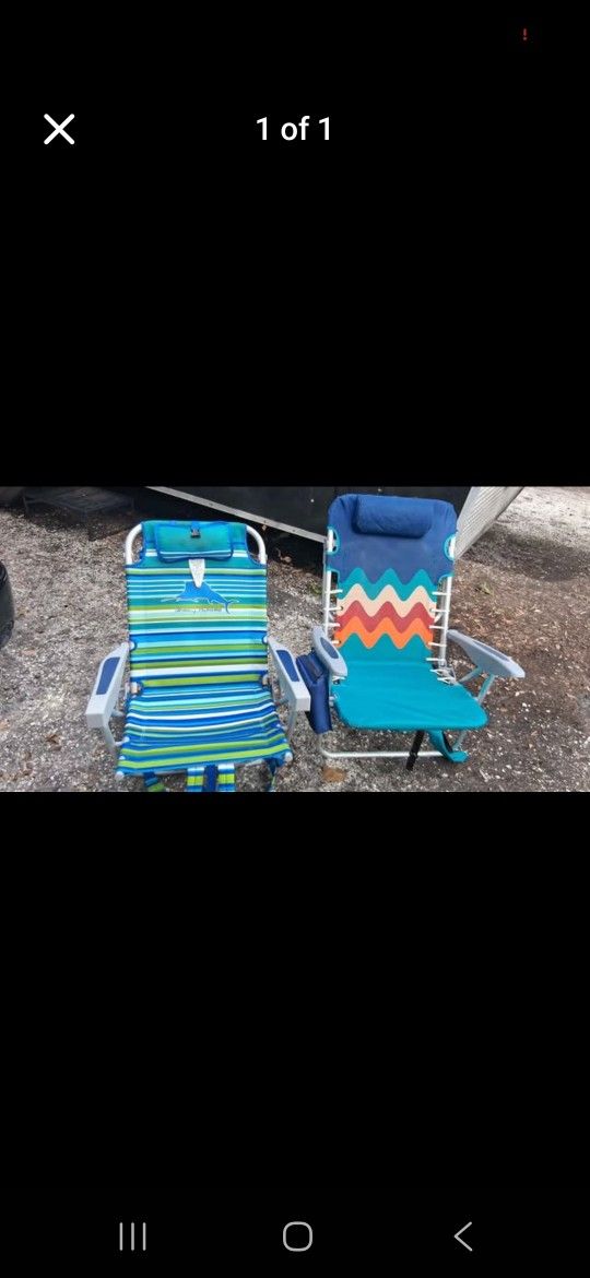 2 Backpack Beach Chairs With Zip Pockets And  Foam Head Rests,backpack Straps And They Adjust To Recline.
