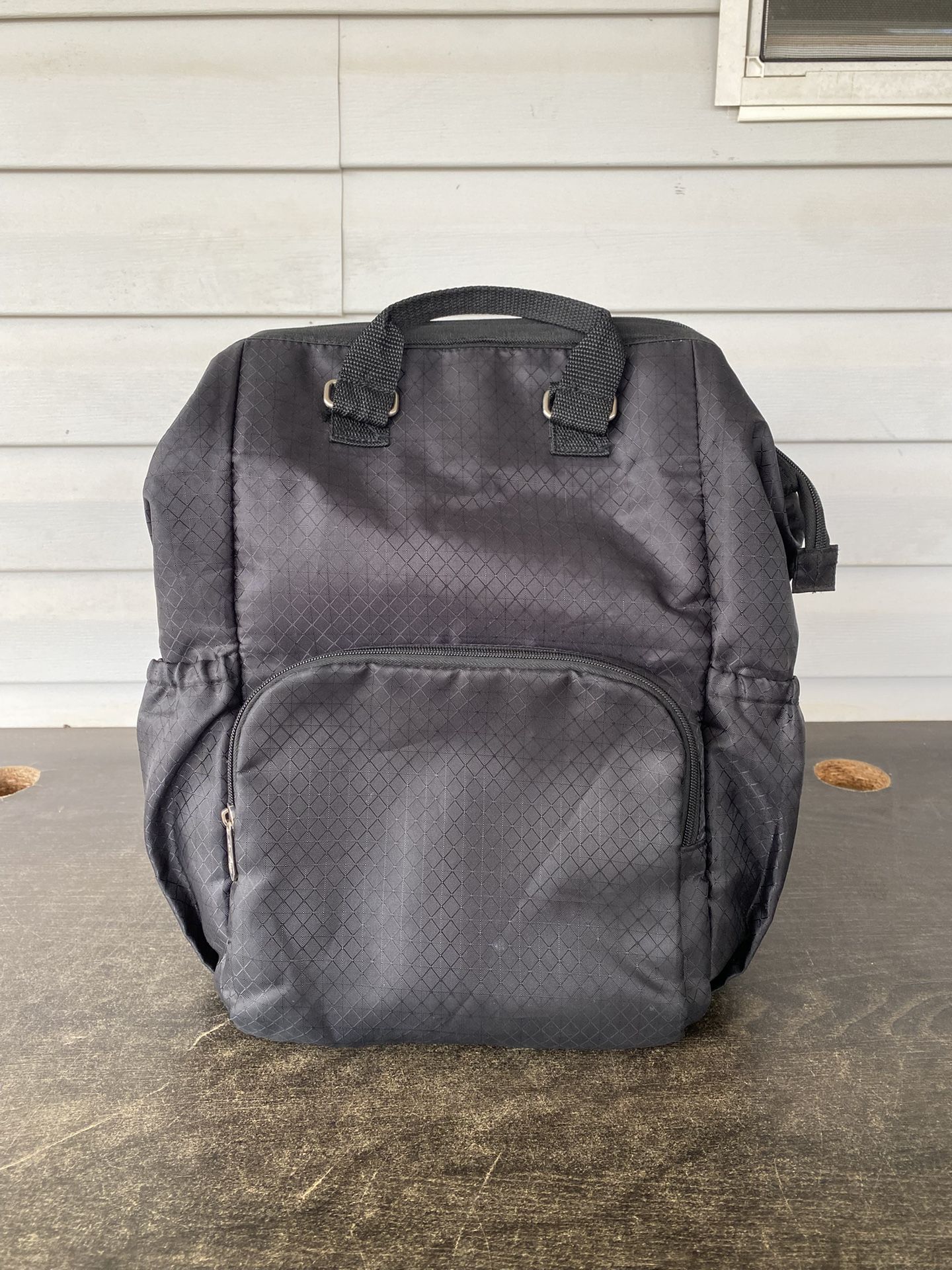 Thirty-one black backpack with padded straps and durable design