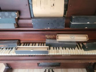 Howard manualo upright piano