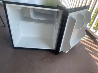 Brand: BLACK+DECKER * Model: BCFA17B * Capacity: 1.7 cu. ft. * Color: Black * Type: Single-door mini fridge with a small freezer compartment * Voltage