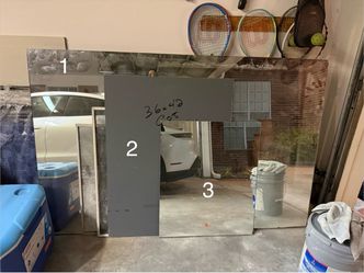 Three bathroom mirrors - different sizes