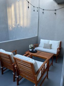 Outsunny 4-Piece Solid Acacia Patio Set: Loveseat, 2 Armchairs + Coffee Table, Cushions + Covers