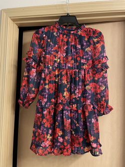 Brand new adorable size 7/8 Girls floral dress. Never worn. Granddaughter outgrew.