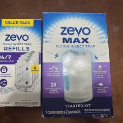 Zevo flying insect trap. 1 device and 4 total cartridges. Used once 