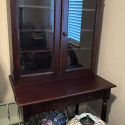 Antique cabinet with glass doors and adjustable shelves and drawer